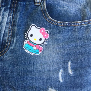 Hello Kitty blå dräkt jeans - tygmärke