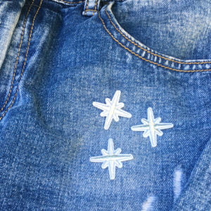 Tre kompasstjärnor silver jeans - tygmärke