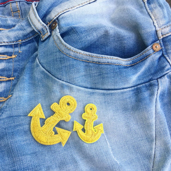 Två Guldankare jeans - tygmärke
