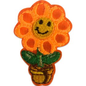 Orange blomma - Tygmärke