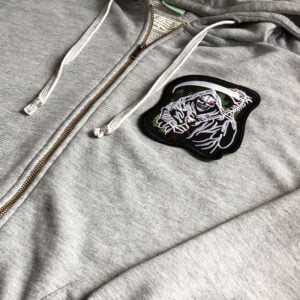 Alternative view of Grim Reaper - Tygmärke