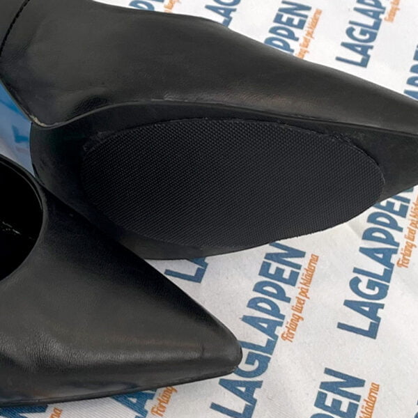 Svarta halkskydd för högklackade skor