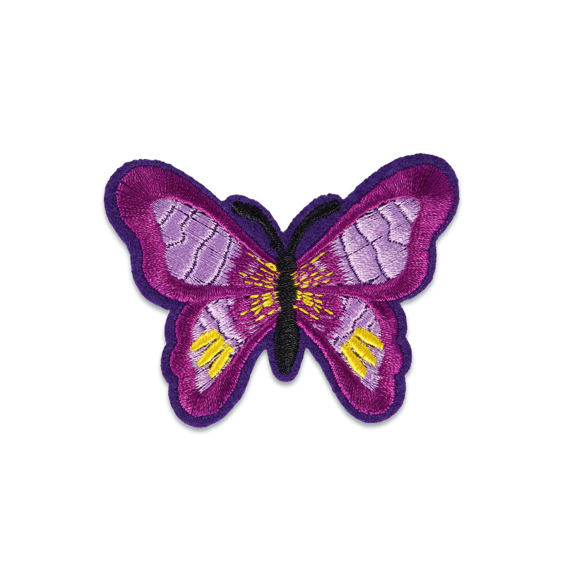 tygmärke fjäril lila