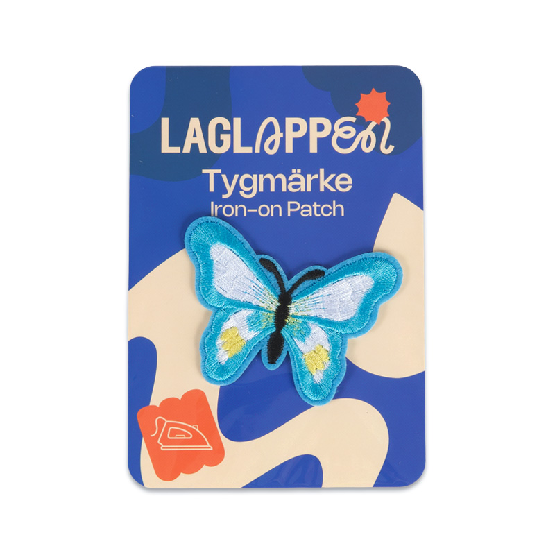 Fina fjärilar - Tygmärke - Ljusblå