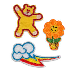 tygmärken nalle, blomma, blixt