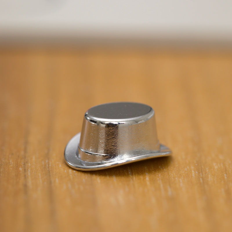 monopol spelpjäs hatt